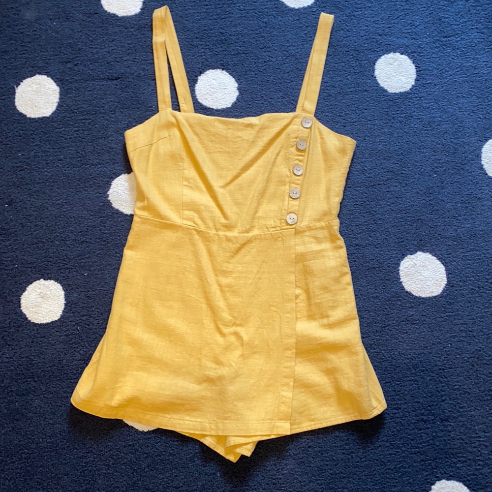 Pale orange romper with button detailing